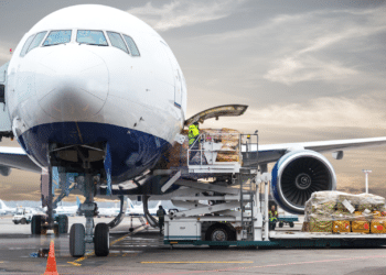 Cargo is loaded onto an airplane